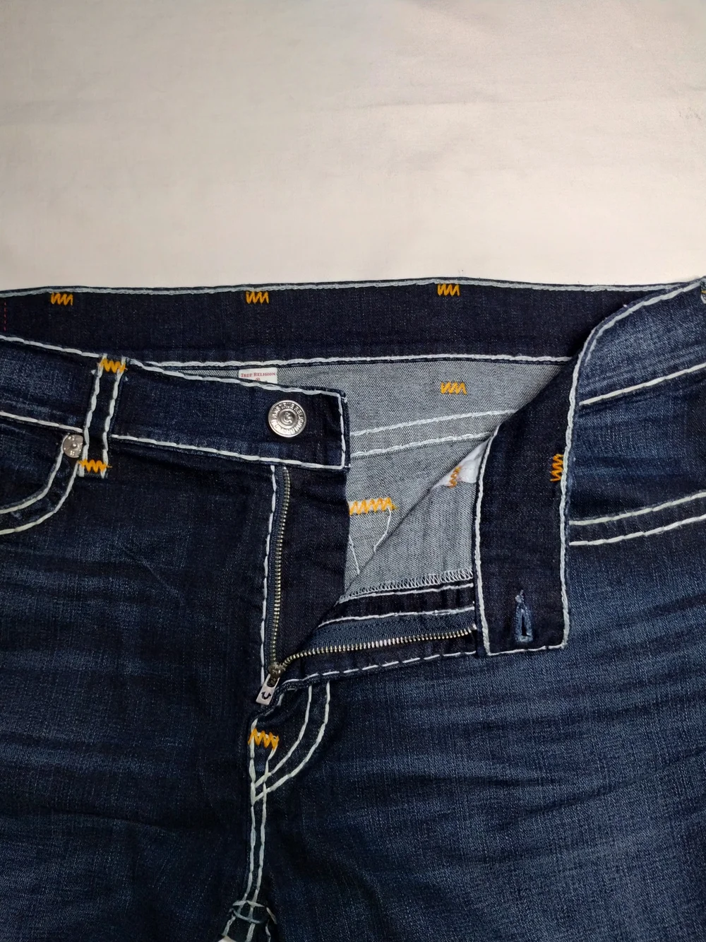 True Religion Dark Blue Denim Cutoff Shorts with Contrast Stitching